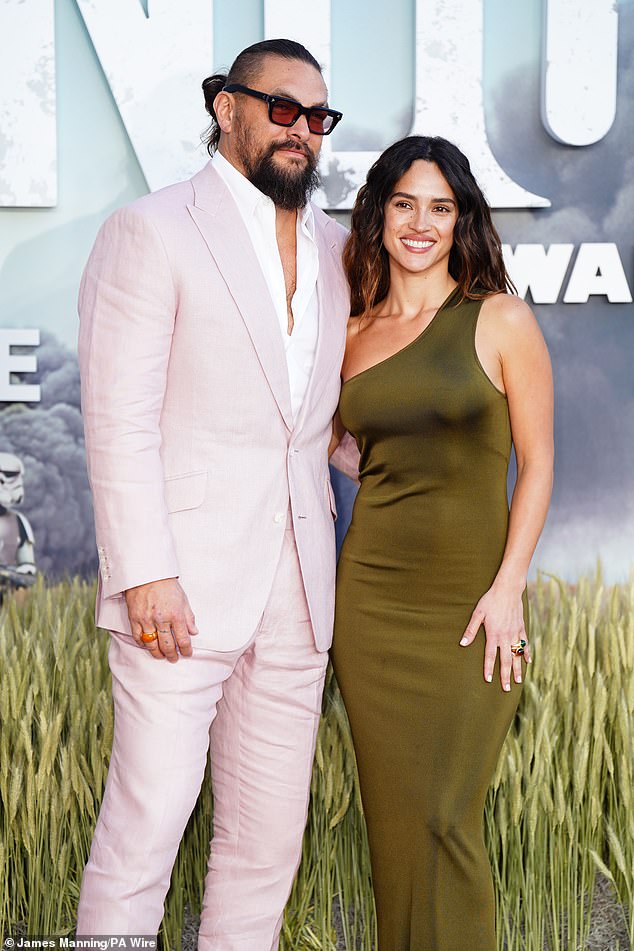 Jason Momoa, 45, and Girlfriend Adria Arjona, 32, Share Smitten Poses at Andor Season Two Premiere  
or  
Jason Momoa and Adria Arjona Look Smitten in Cozy Photos at Andor Season 2 Premiere  
(Note: Italics for the show title and optional age inclusion based on stylistic preference.)