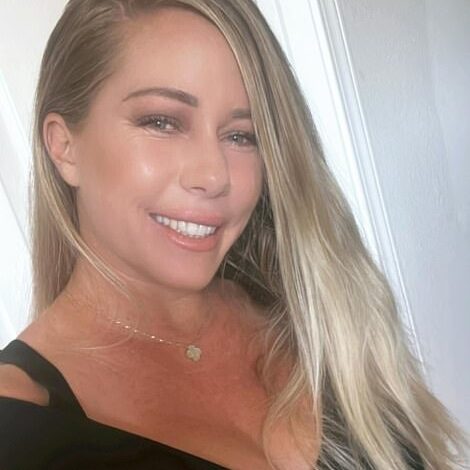 Kendra Wilkinson Addresses Fan Claims She’s ‘Still Holding on to Her Ex’ in Emotional Post  
This title retains the core elements (subject, fan critique, emotional context) while streamlining phrasing for clarity and concision.