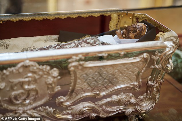 "Saint Teresa’s 440-Year Miracle Corpse Unveiled After Century-Long Hiatus"  
This title condenses key details: the saint’s miraculously preserved body, its 440-year