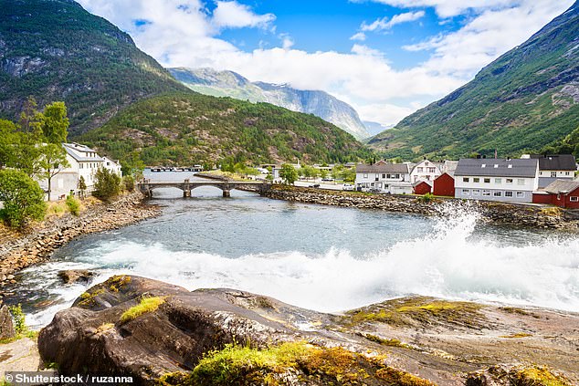Title: "European Village: Tourist Haven and Filmmaker’s Muse Under Threat of Record Tsunami"  
(14 words, concise, highlights tourism, cinematic appeal, and the unprecedented tsunami risk.)
