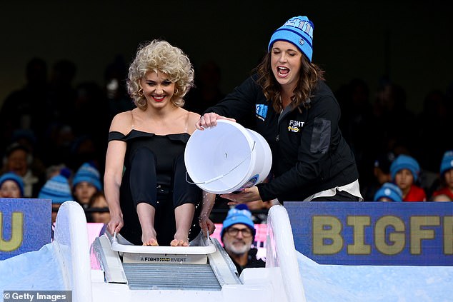 Ariarne Titmus Stars at AFL Big Freeze as MCG Honors MND Warrior Neale Daniher