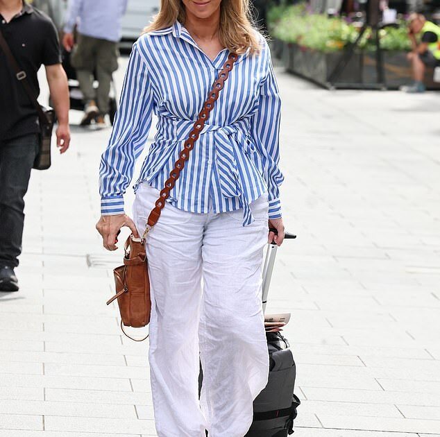 Title: "Kate Garraway Reveals Bailiffs Visited During Late Husband Derek Draper’s Hospital Coma"  
(Note: Adjusted to include Derek Draper’s name for clarity and specificity while maintaining conciseness.)