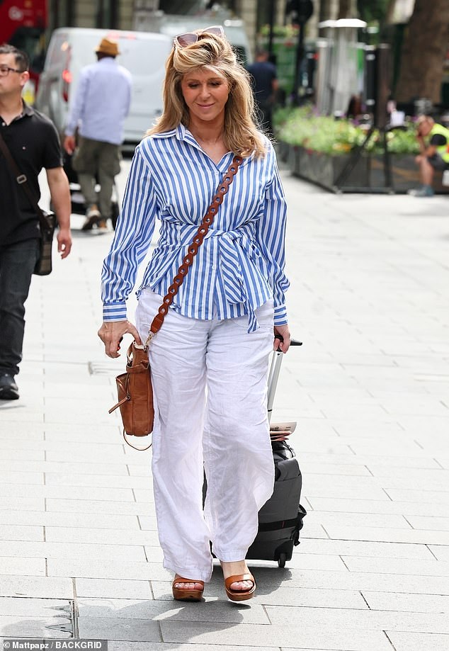 Title: "Kate Garraway Reveals Bailiffs Visited During Late Husband Derek Draper’s Hospital Coma"
(Note: Adjusted to include Derek Draper’s name for clarity and specificity while maintaining conciseness.)
