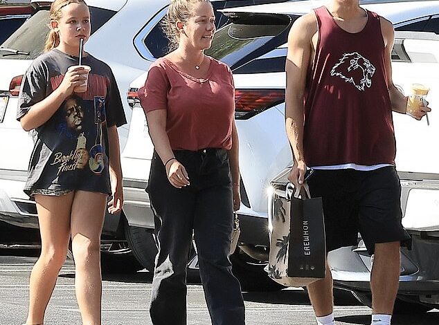 Kendra Wilkinson, 40, Steps Out with Her Two Kids as 15-Year-Old Son Towers Over Her  
This version maintains clarity, conciseness, and all key details: her age milestone, both children, and the son’s height.