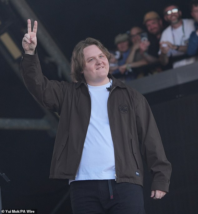 Title: Lewis Capaldi Returns to Glastonbury Stage Emotionally After Two-Year Hiatus Due to Tourette’s Battle That Halted Past Performance
This version retains all key details—emotional return, Glastonbury context, hiatus duration, and the cause (Tourette’s-related interruption)—while maintaining clarity and conciseness.