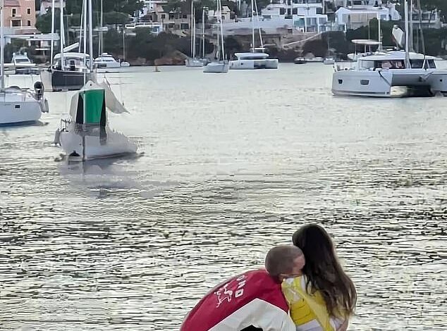 Title: Justin Bieber Clings to Wife Hailey on Beach Following Fan Concern Over Son Jack’s Studio Visit