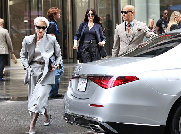 Title: "Meryl Streep and Anne Hathaway Film ‘Devil Wears Prada’ Sequel Blocks from NYC Mass Shooting That Killed Four"  
This version retains key details (sequel filming, location proximity, shooting impact) while streamlining the phrasing for clarity and concision.