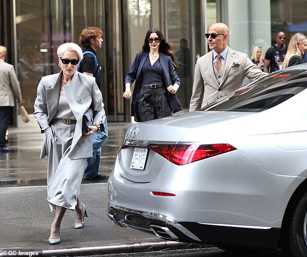 Title: "Meryl Streep and Anne Hathaway Film ‘Devil Wears Prada’ Sequel Blocks from NYC Mass Shooting That Killed Four"  
This version retains key details (sequel filming, location proximity, shooting impact) while streamlining the phrasing for clarity and concision.