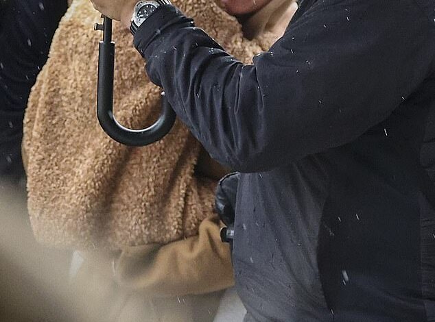 Katy Perry Holds Daughter Daisy Dove During Australia Departure in First Sighting Since Orlando Bloom Split  
(Note: Adjusted phrasing for conciseness and clarity while preserving key details.)