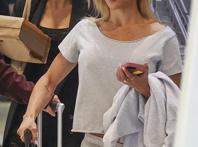 Tammy Hembrow Offers Relationship Update While Sporting Casual Tracksuit at Sydney Airport