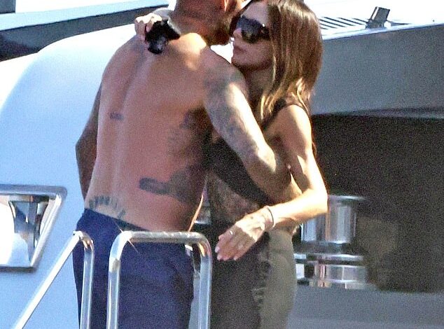 Title: David Beckham Playfully Squeezes Wife Victoria’s Bottom During Lavish Italian Getaway on £16M Superyacht