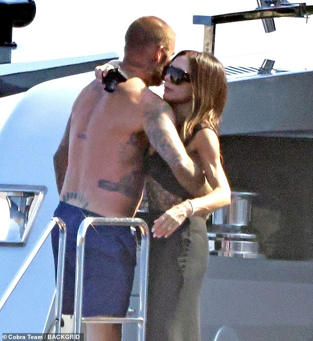 Title: David Beckham Playfully Squeezes Wife Victoria’s Bottom During Lavish Italian Getaway on £16M Superyacht