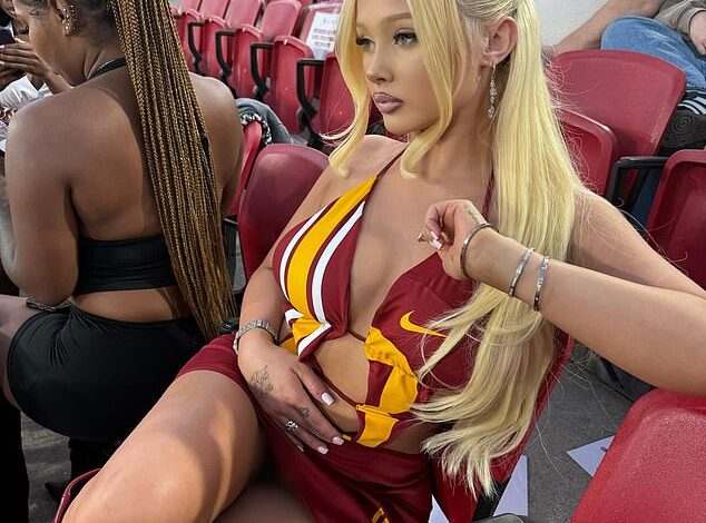 Alabama Barker Transforms Football Game Into Sizzling Photo Shoot  
(Note: The original title’s reference to "Kourtney Kardashian’s stepdaughter" is omitted here for brevity and directness, as the rewritten title focuses on the core action. If the familial connection is essential, it can be included as: "Kourtney Kardashian’s Stepdaughter Alabama Barker Transforms Football Game Into Sizzling Photo Shoot.")