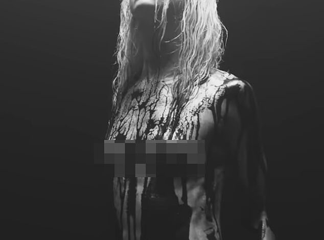 Title: "Gossip Girl Star Taylor Momsen Appears Naked in New Music Video"
This version maintains clarity, removes sensationalized formatting (all caps), and preserves key details: her association with Gossip Girl, the context of the music video, and the mention of nudity.