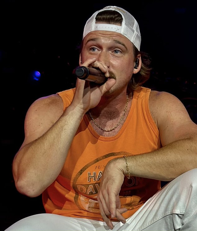 Morgan Wallen Pauses Mid-Concert to ‘Send Prayers’ to Charlie Kirk’s Widow Erika  
This title retains the key details—halting the performance, the act of sending prayers (in quotes for direct attribution), and Erika’s connection to Charlie Kirk—while using concise, fluid phrasing.