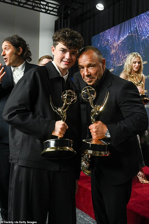 Title: "Owen Cooper’s Heartwarming Reaction to Co-Star Stephen Graham’s Emmy Win for Outstanding Lead Actor in Adolescence"  
Key Adjustments:  

Replaced "Sweet moment" with "Heartwarming Reaction" for a polished tone.  
Structured to emphasize the emotional response and clarify the award/show details.  
Italicized Adolescence for title formatting.  
Streamlined phrasing while retaining all critical information.
