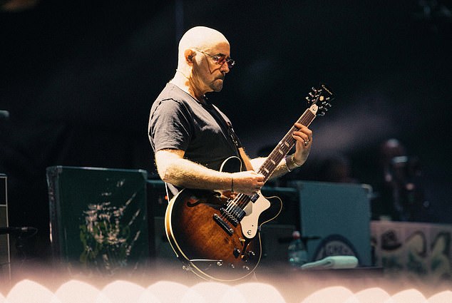 Oasis Name Replacement for Bonehead as Guitarist Takes Tour Break for Cancer Treatment.