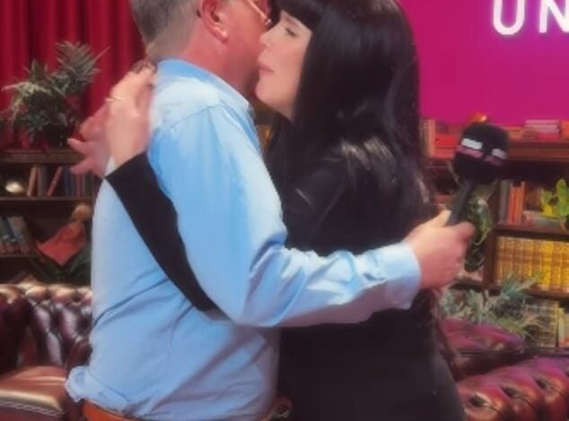 Title: Paloma Faith and Alan Carr Exchange Begrudging Hug at Celebrity Traitors Reunion Following Apology for ‘Murdering’ Her  

Key Adjustments:  

Removed redundant phrasing ("one another," "he apologised") while retaining clarity.  
Streamlined structure for conciseness.  
Maintained quotes around ‘murdering’ to highlight contextual/figurative use.  
Italicized Celebrity Traitors as a show title.  
Used "Following" instead of "After" for smoother flow.
